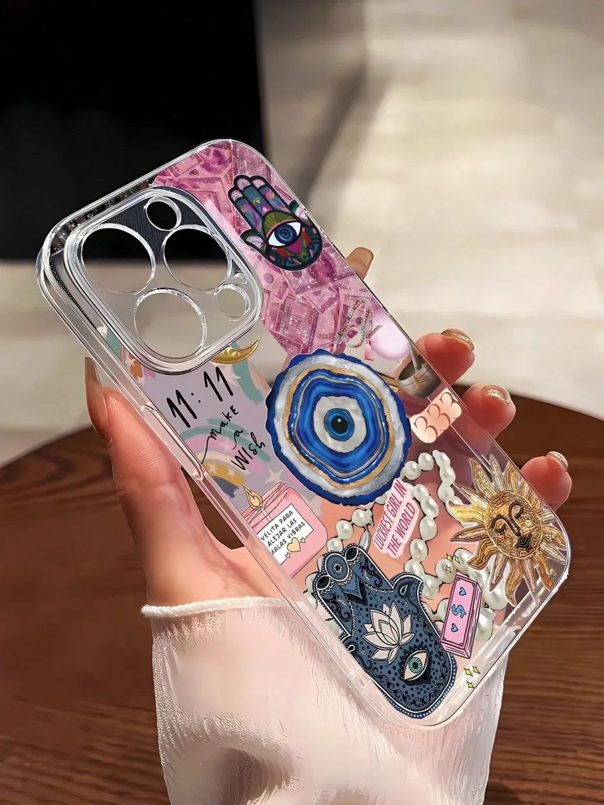 A transparent, shockproof protective case compatible with iPhone models 15 Pro Max