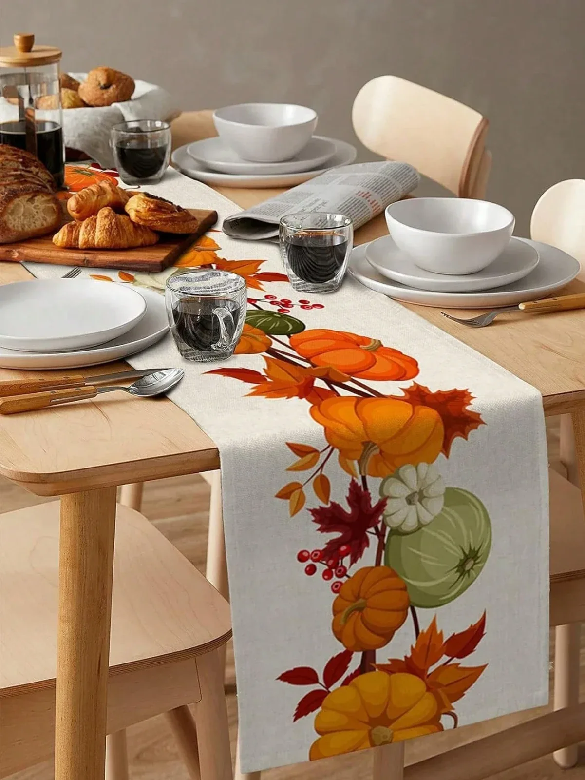 Linen tablecloth with autumn maple leaves and harvest pumpkins, reusable holiday party decor.