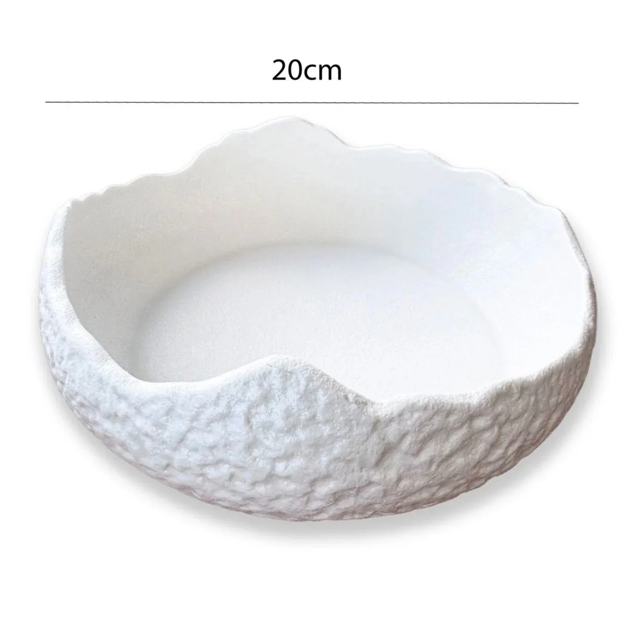 decorative ceramic bowl with a textured, organic shape